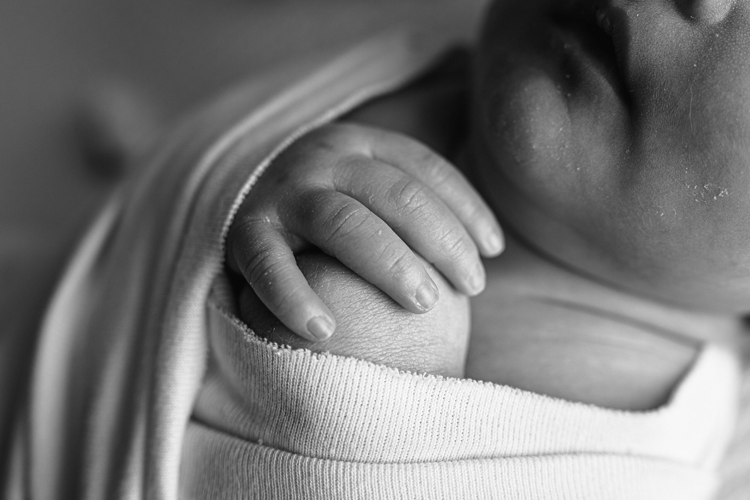 black and white baby girl isla detail photos of fingers