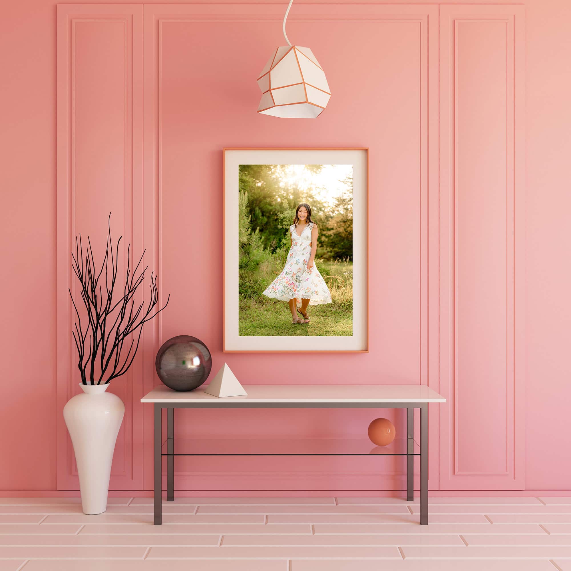 charlotte catholic senior gallery on pink wall of her home