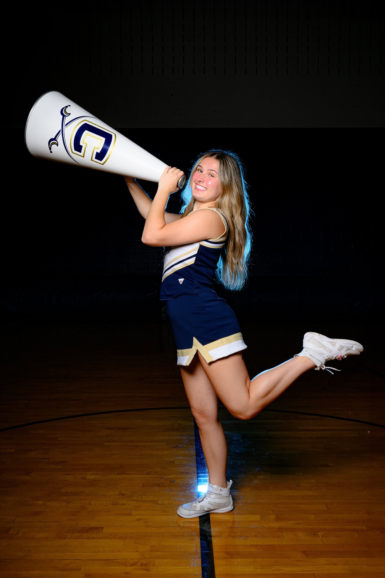Charlotte area senior holding a megaphone during her media day photos