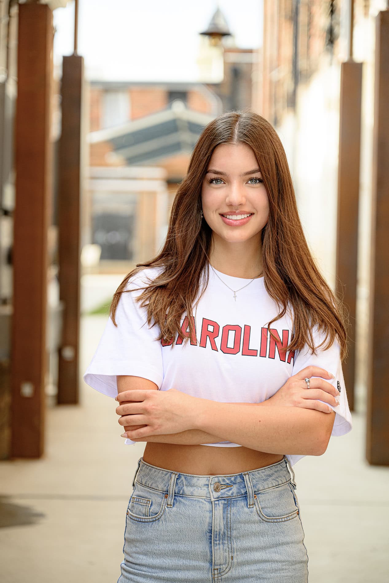 Charlotte senior wearing her carolina white t shirt