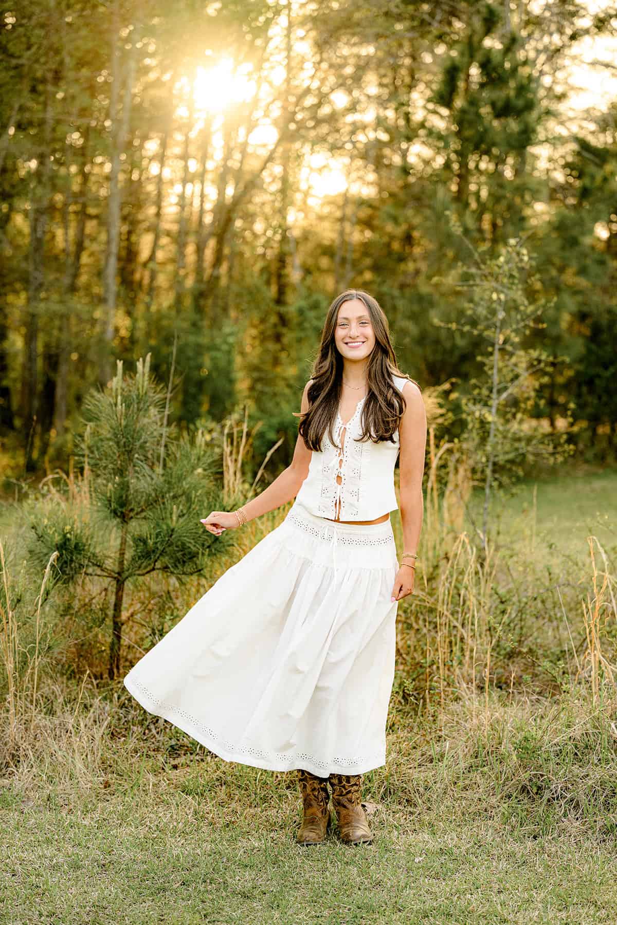 high school senior from charlotte catholic wearing a cream two piece outfit for her graduation invitations images