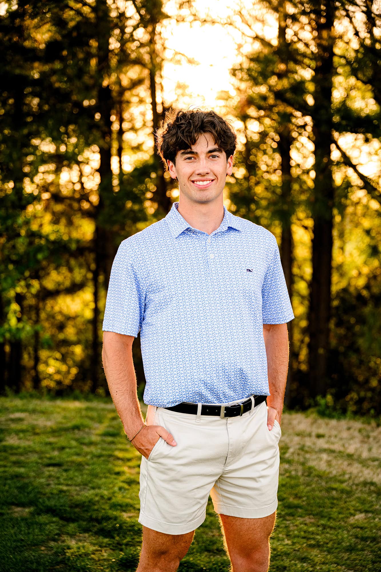 dark hair charlotte senior during his golf portraits 