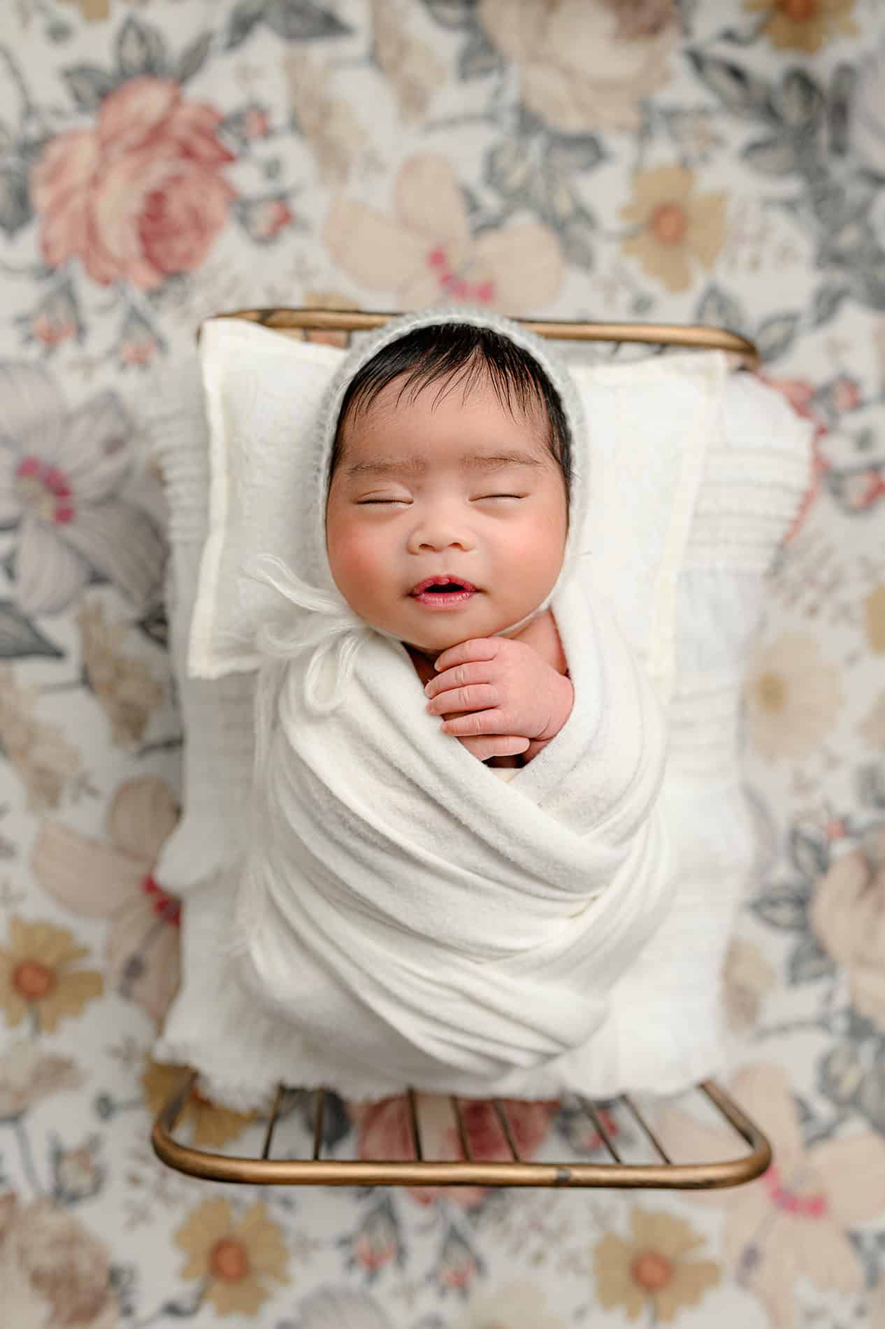 floral newborn photo to work with floral themed baby shower theme
