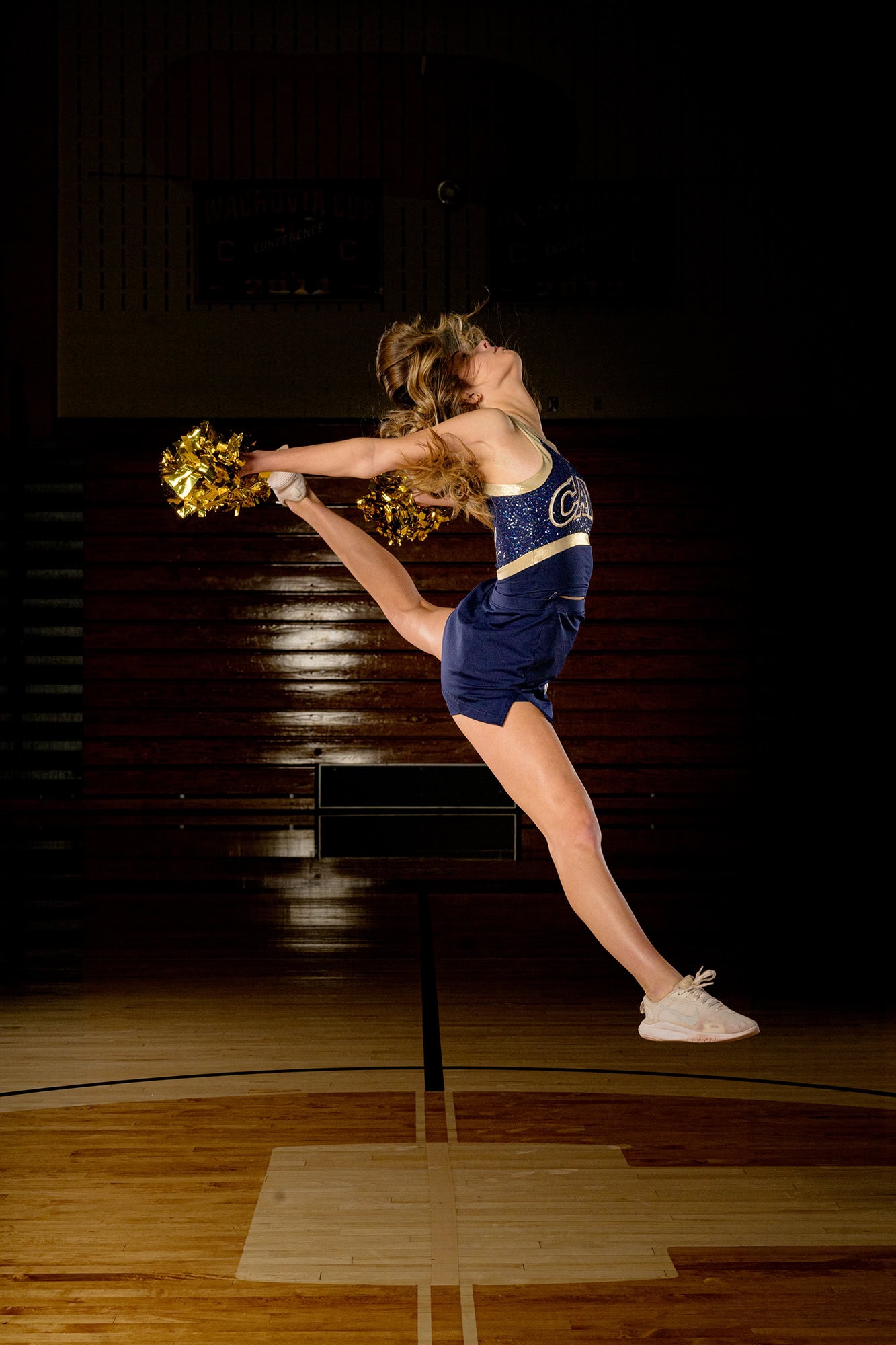 dancer in leap during media day session