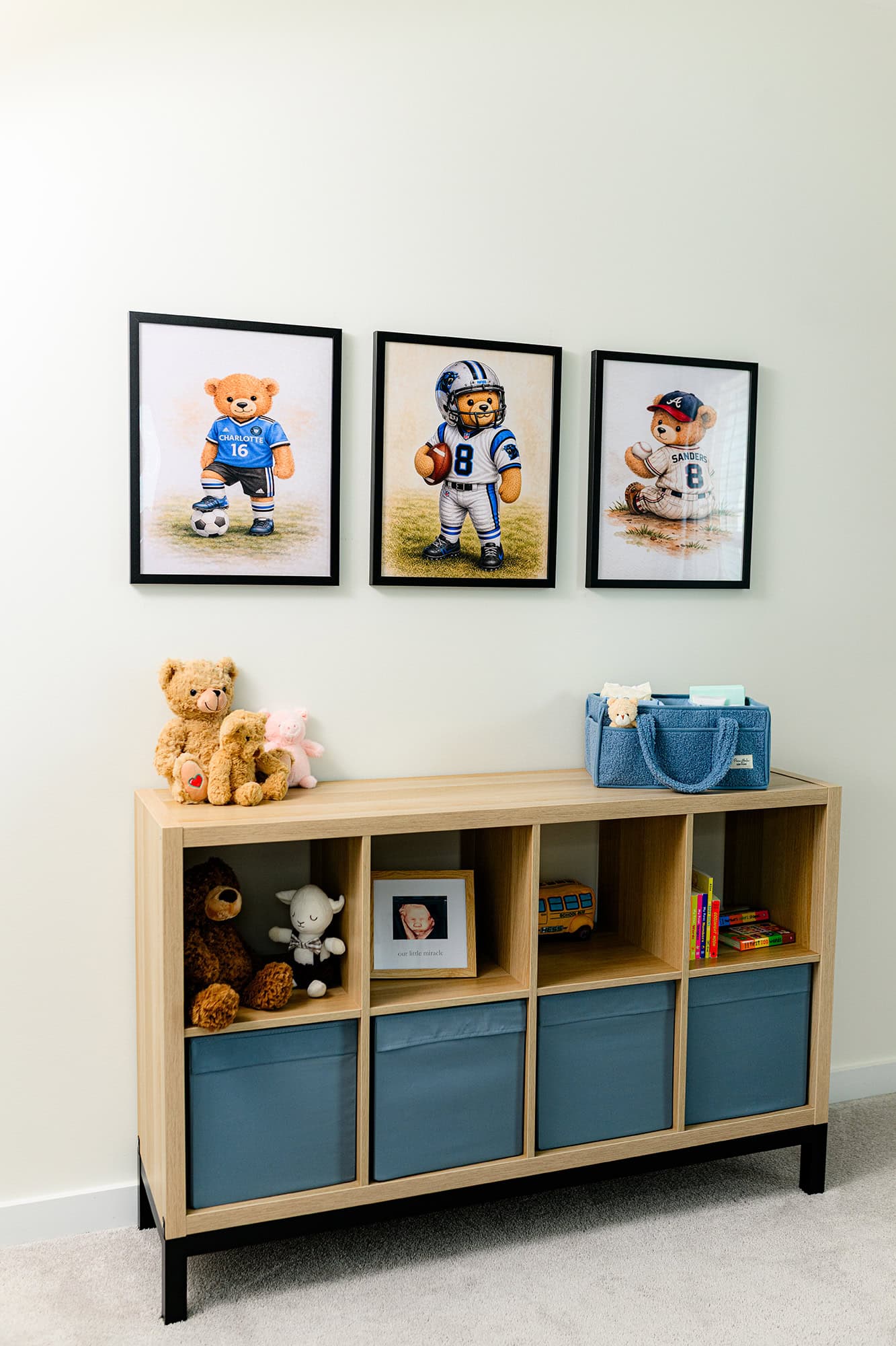 teddy bear art on wall of newborn nursery as part of lifestyle newborn photo